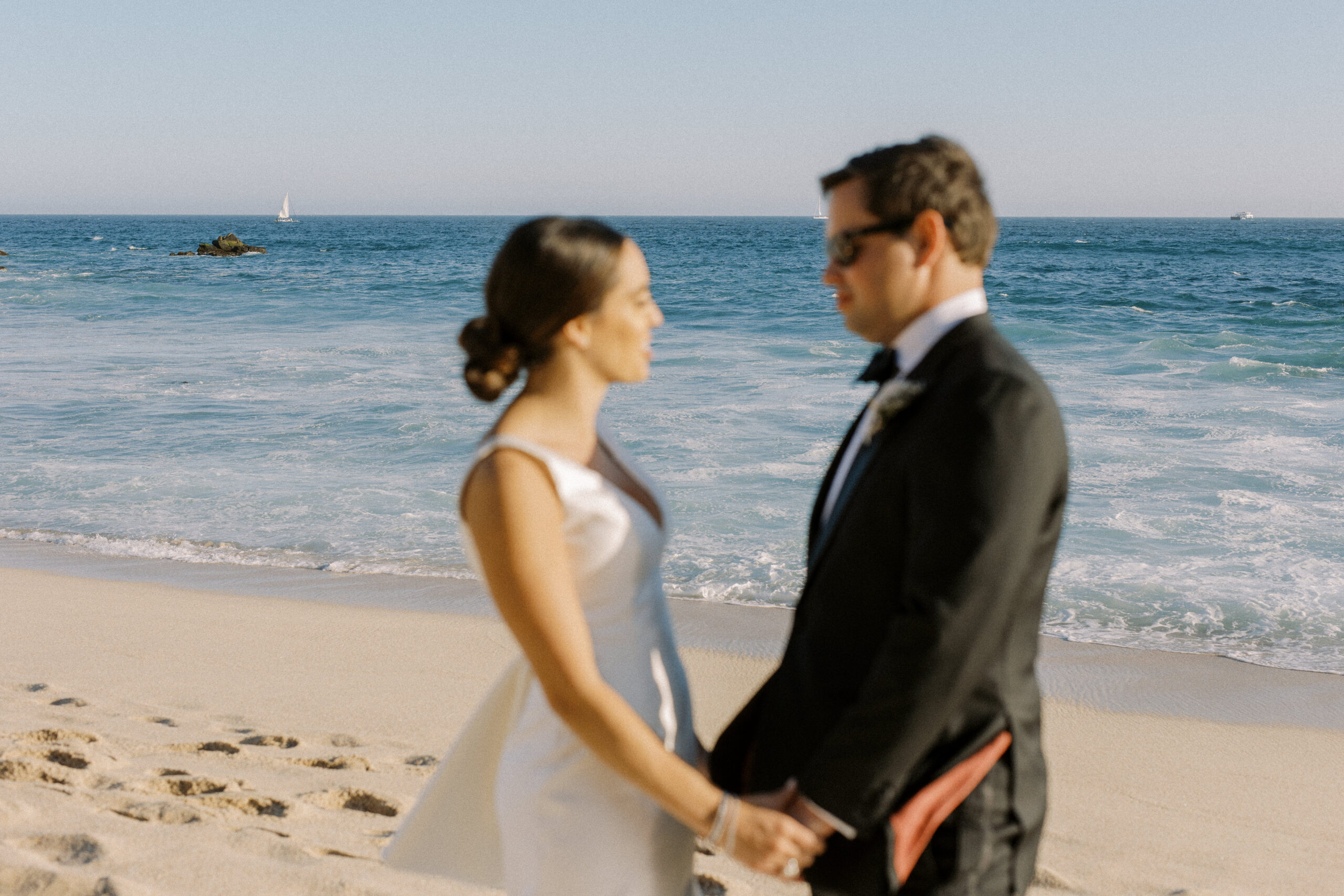 married couple on the beach of cabo san lucas